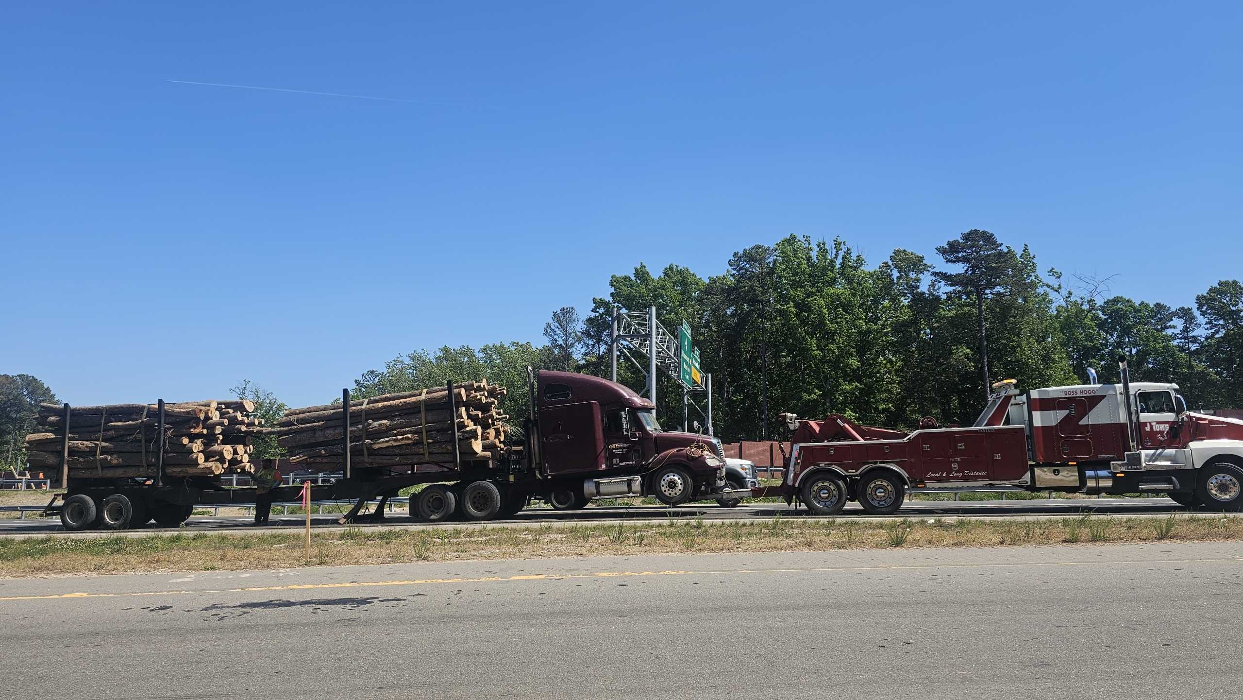 Big Bertha Towing Log Truck 1