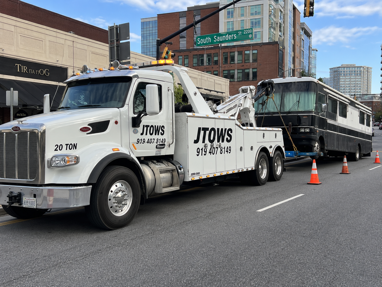 JTOWS towing a bus-sized coach in downtown Raleigh